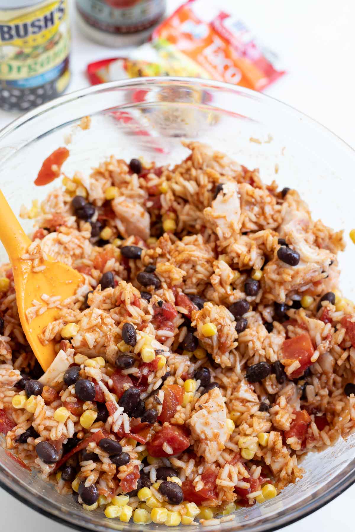 taco casserole ingredients in clear mixing bowl