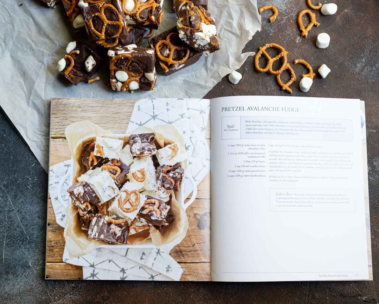 cookbook open to fudge recipe next to fudge squares