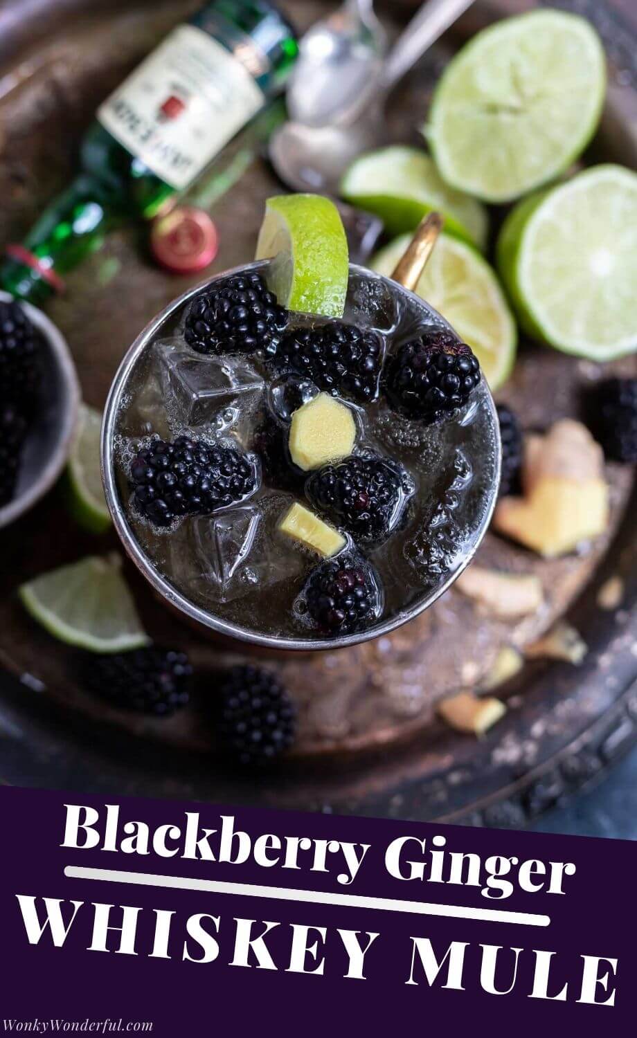 Get festive this holiday season with this Blackberry Ginger Whiskey Mule Drink recipe. Fresh blackberries and ginger mixed with whiskey and ginger beer for a fun, refreshing holiday cocktail. Moscow Mule drinks are an easy entertaining drink to offer to friends and family. #muledrinkrecipes #moscowmulerecipe #moscowmulerecipes #blackberrymules #whiskeymules #whiskeymoscowmules #cocktailrecipes #holidaycocktails #drinkrecipes#alcoholdrinks #whiskeydrinks #whiskeycocktails