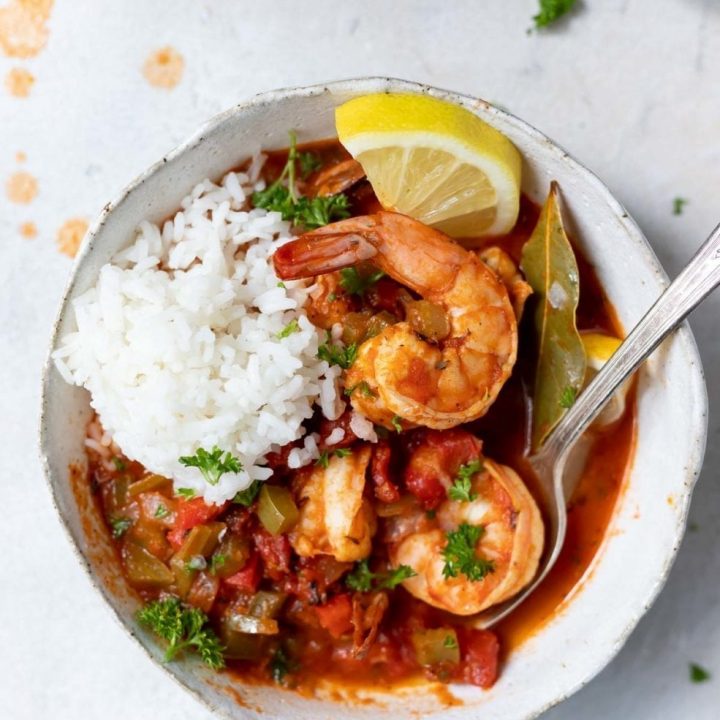 white bowl filled with creole shrimp and rice