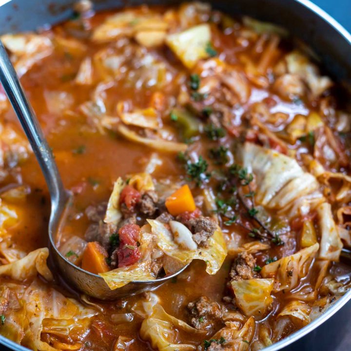 pot of cabbage soup with serving spoon