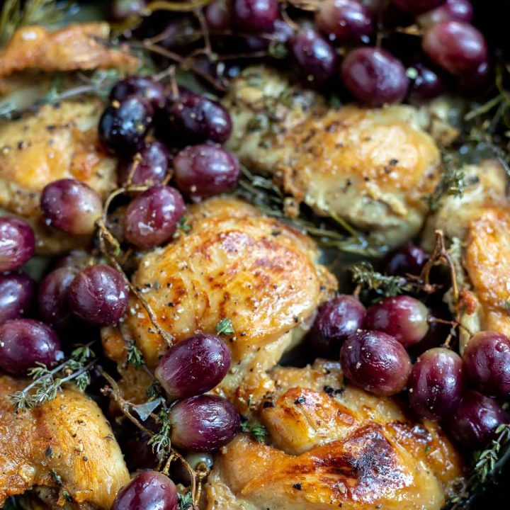 red grapes, chicken thighs and herbs
