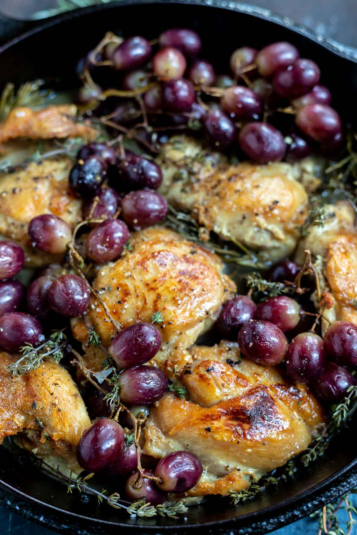 red grapes, chicken thighs and herbs