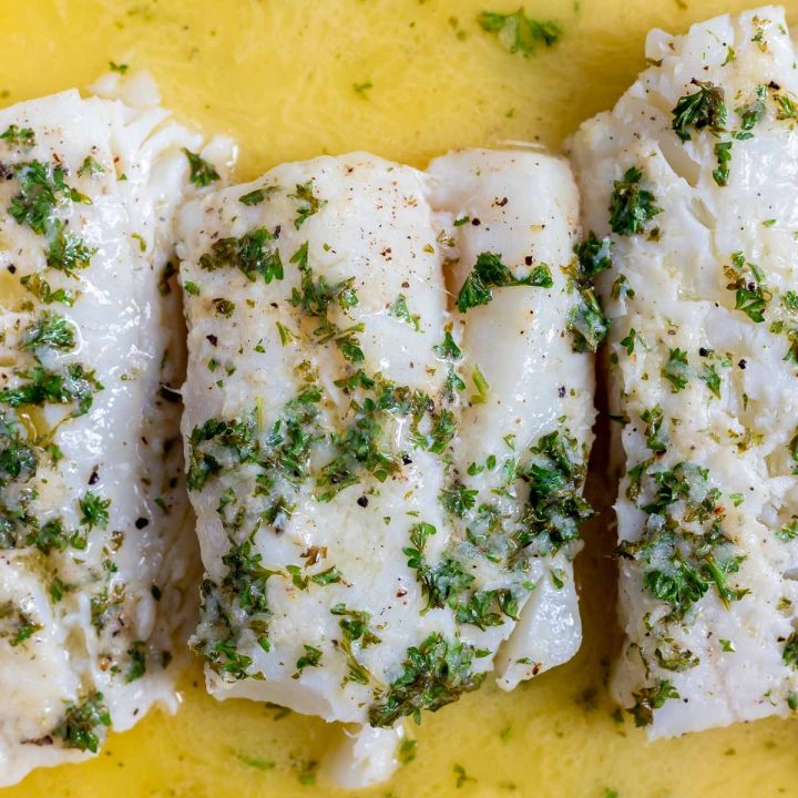 cod in butter topped with parsley