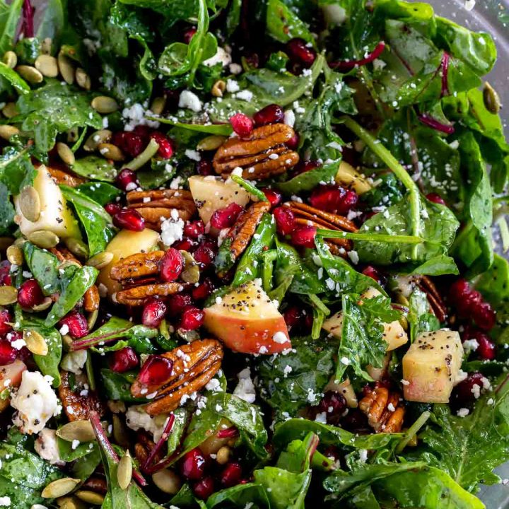 prepared salad in clear glass bowl
