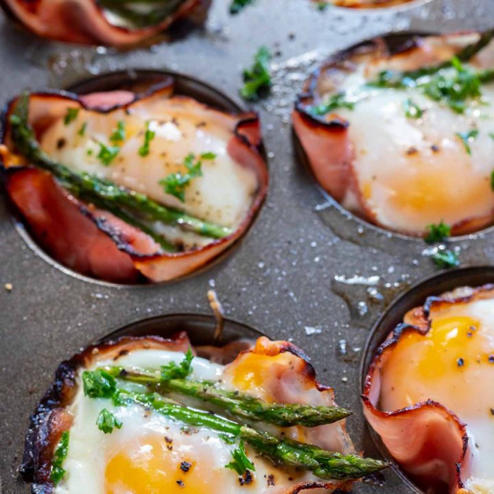 cooked ham egg cups in muffin tin