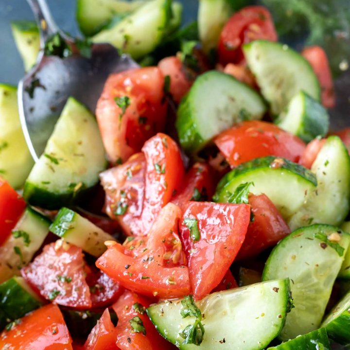 prepared cucumber salad in glass bowl