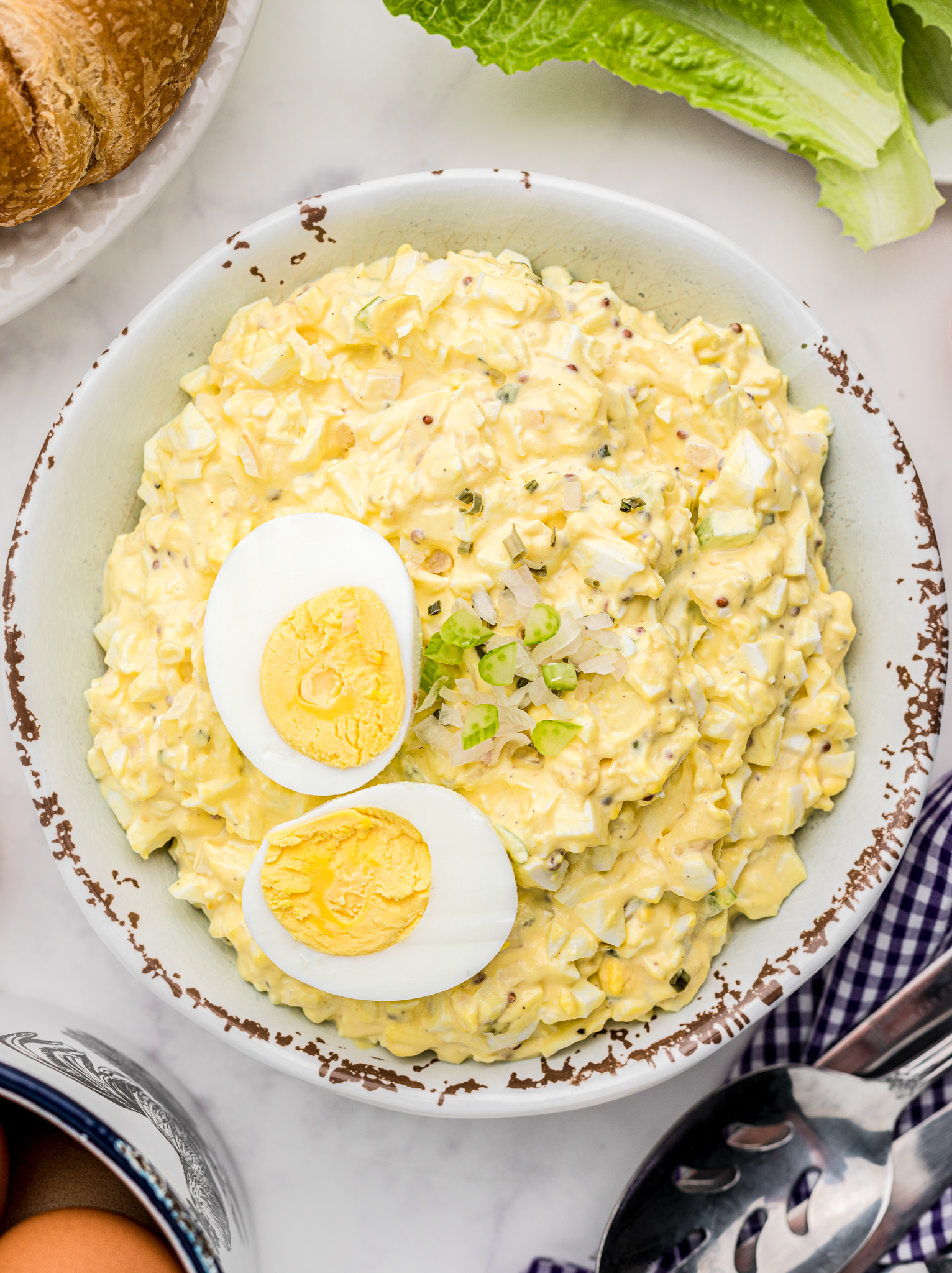 prepared egg salad in glass bowl
