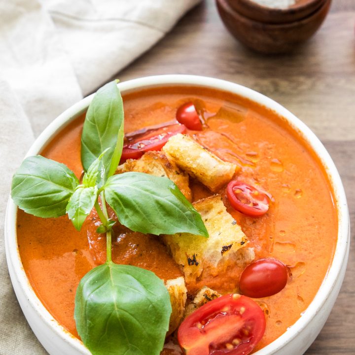 tomato soup in white bowl