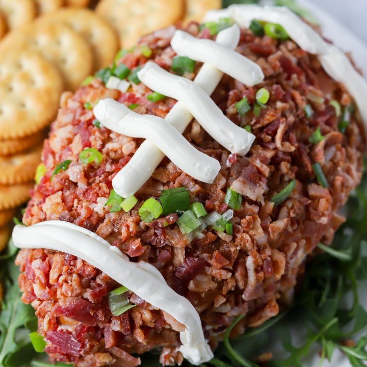 bacon football topped with cream cheese lines