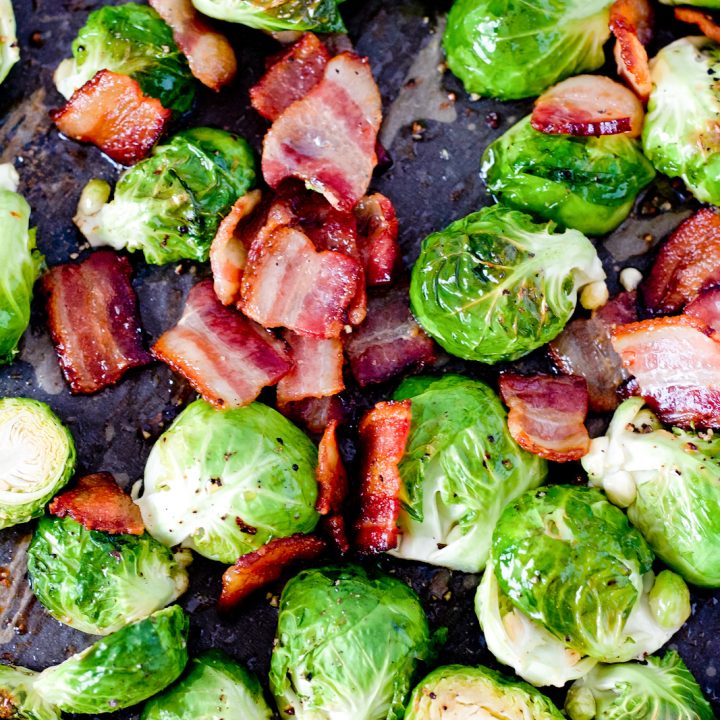 brussels sprouts and bacon on baking sheet