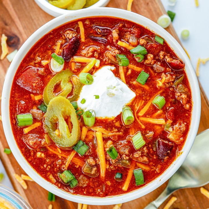 prepared chili topped with jalapeños and sour cream