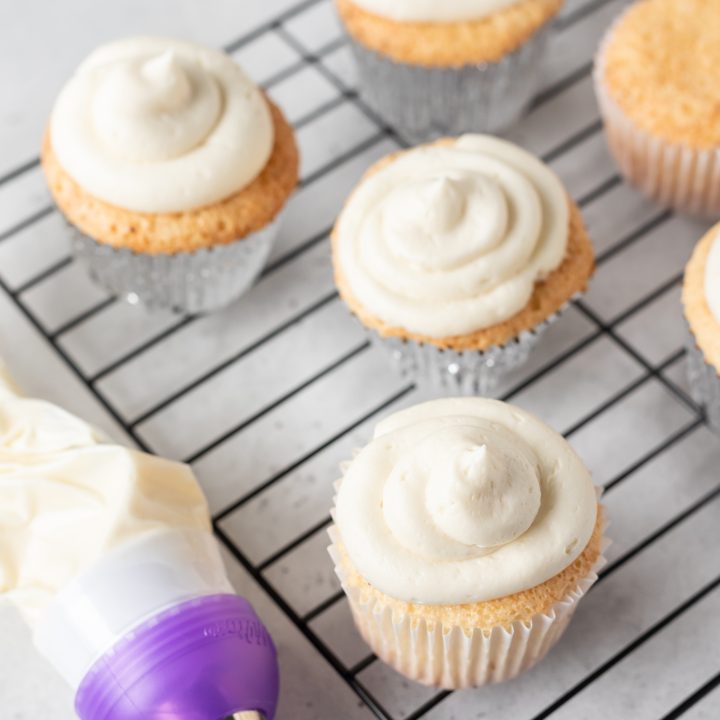 piping bag next to cupcakes