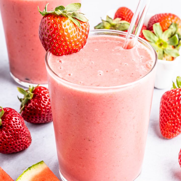 bright pink drink in clear glass