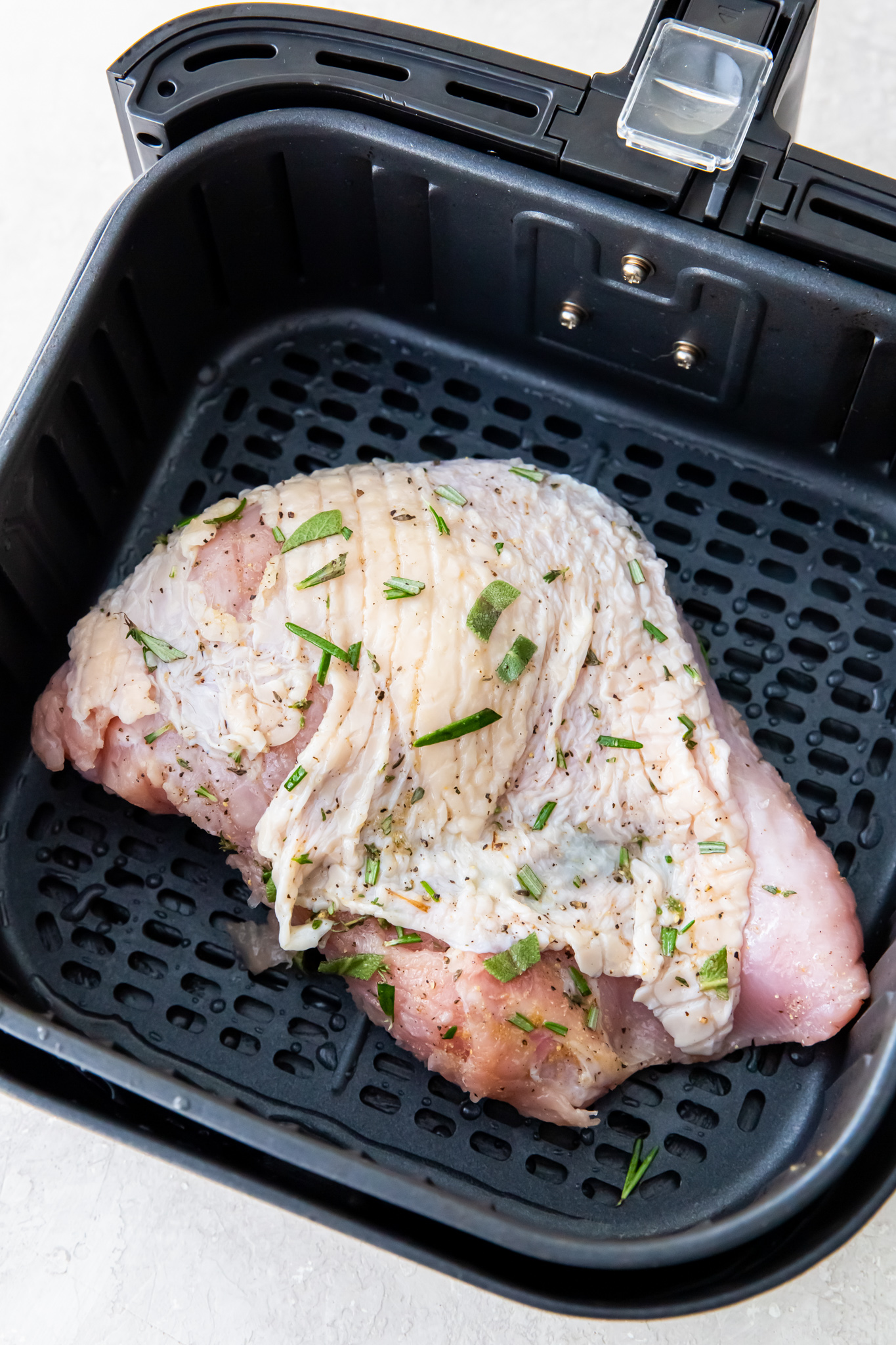 raw turkey in air fryer basket