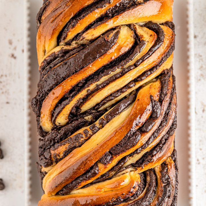 golden baked bread loaf with streaks of chocolate brown
