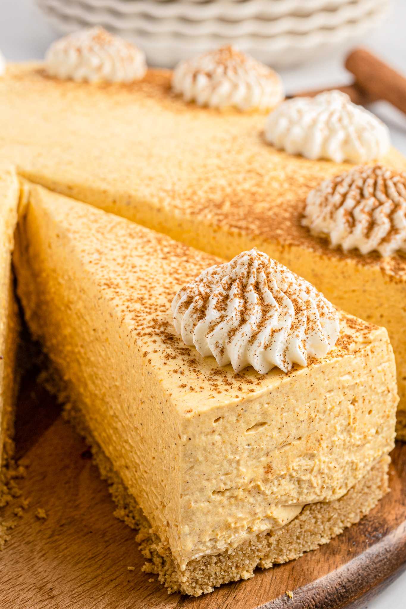 slice of orange colored cheesecake
