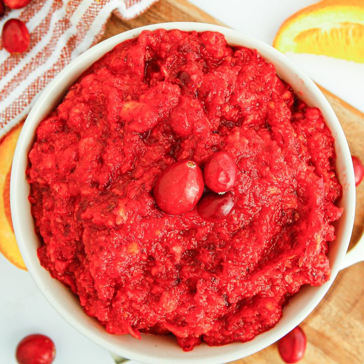 relish topped with cranberries served in bowl