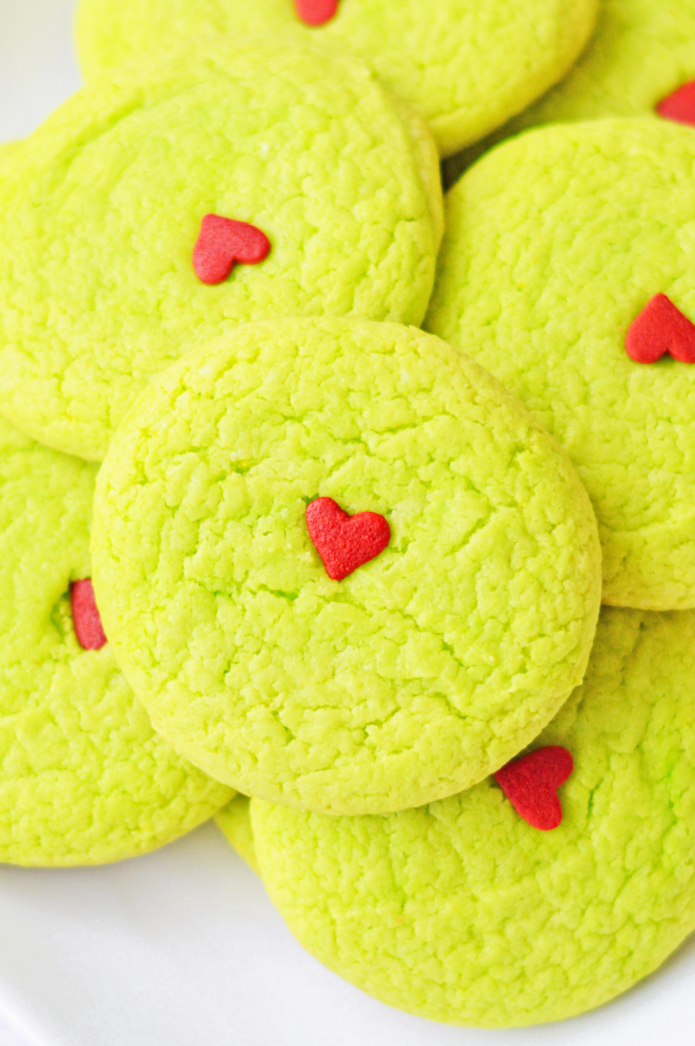 green round cookies with red hearts