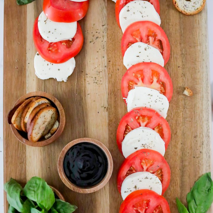 mozzarella and tomato slices on shape of candy cane