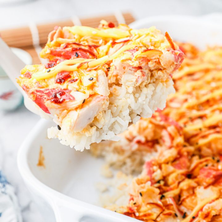 spatula scooping slice of casserole