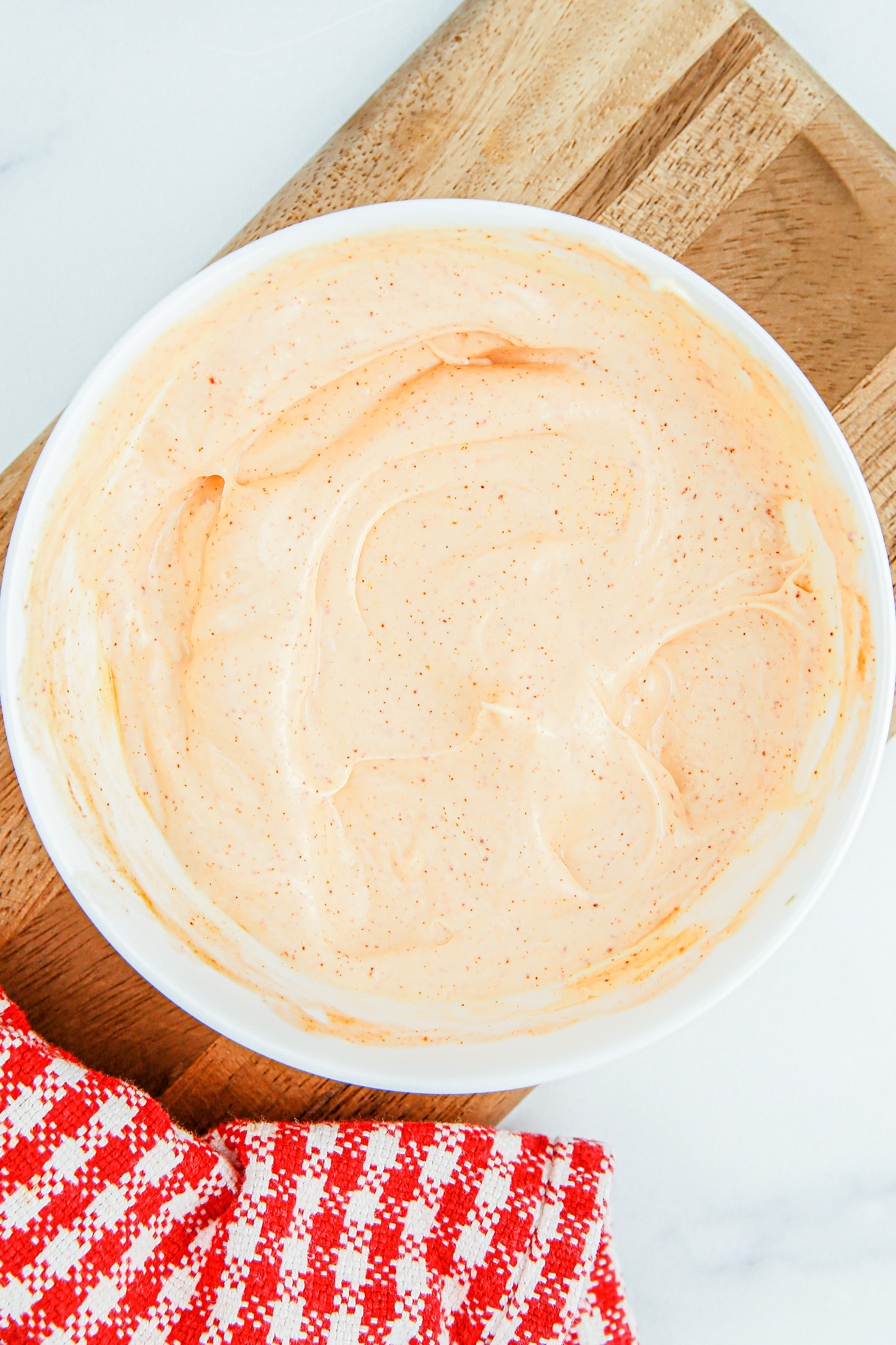 creamy dip in white bowl