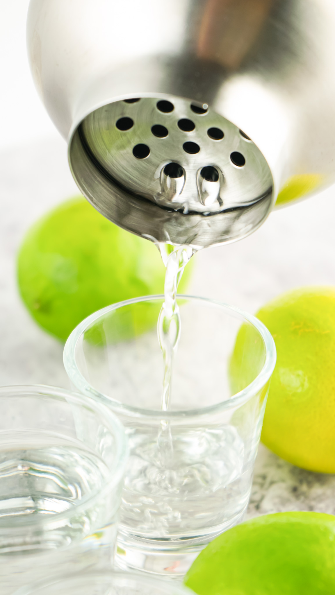 clear liquid poured from shaker