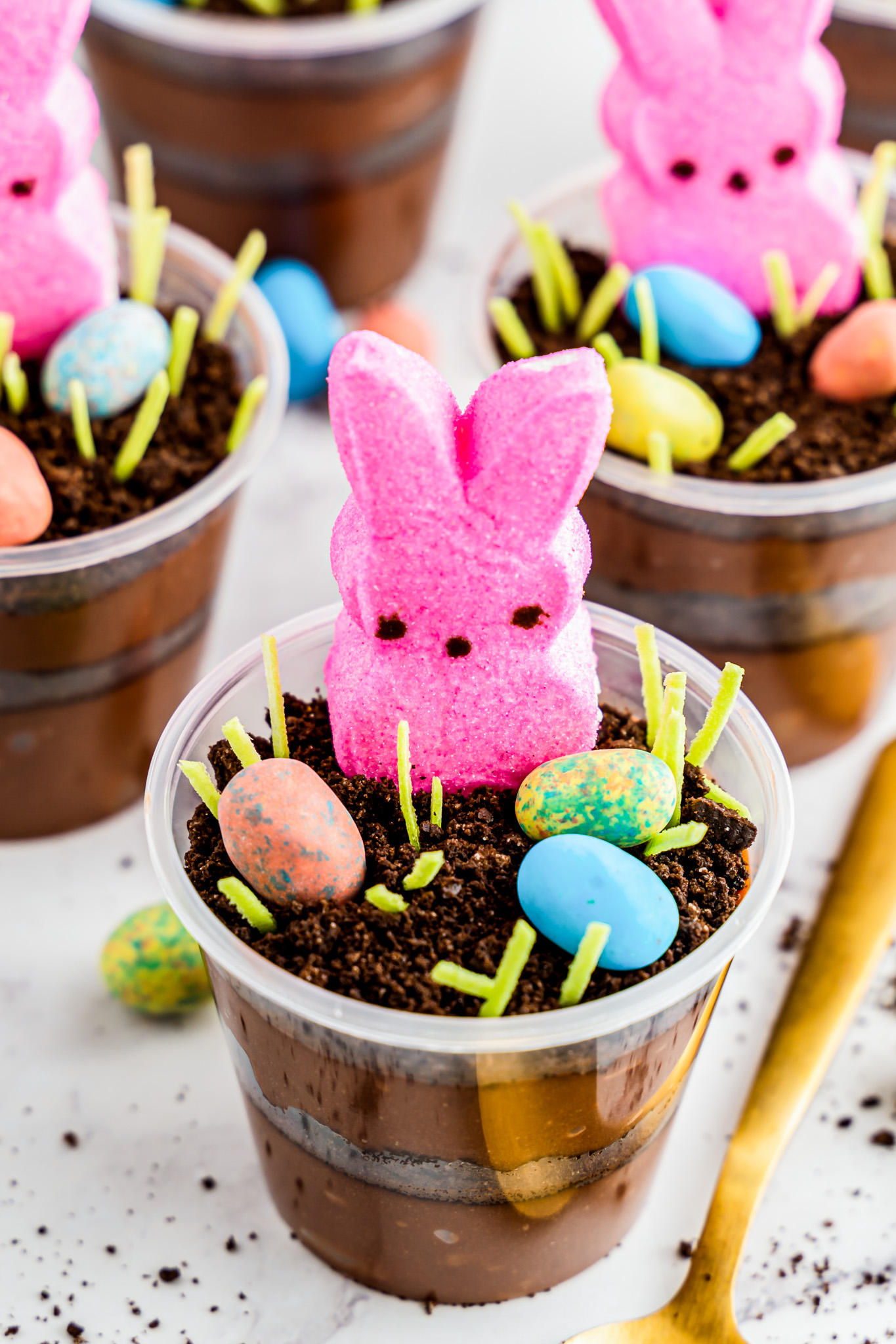 prepared pudding cups topped with easter candy