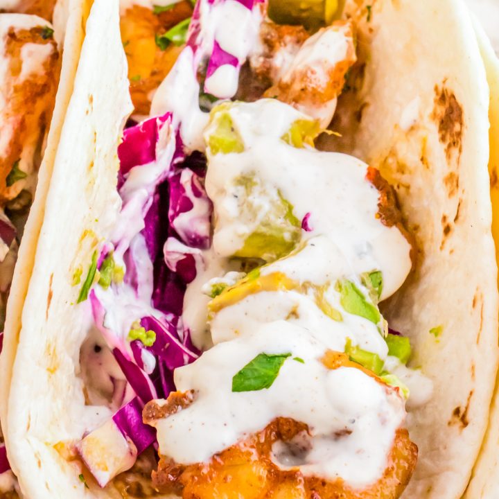 creamy sauce on shrimp taco