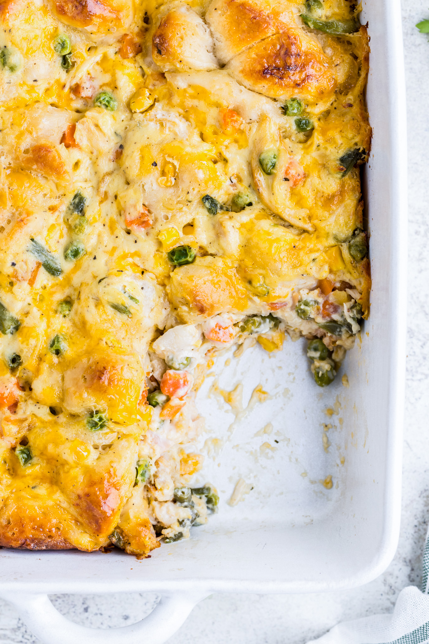 casserole in dish with scoop removed