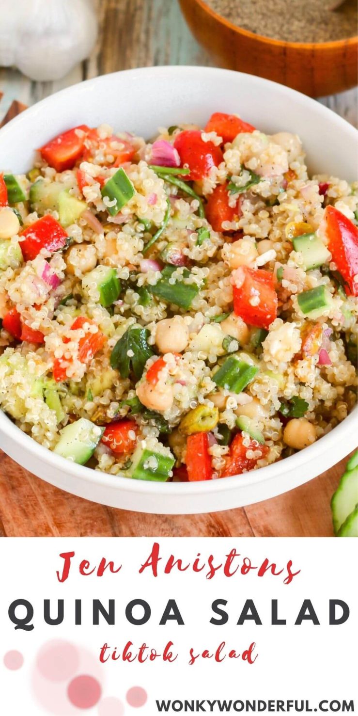 JENNIFER ANISTONS SALAD RECIPE - A simple blend of quinoa, chickpeas, cucumber, feta, onion, pistachios, tomatoes, avocados and peppers tossed in a vinaigrette. Jennifer anistons salad pinnable image