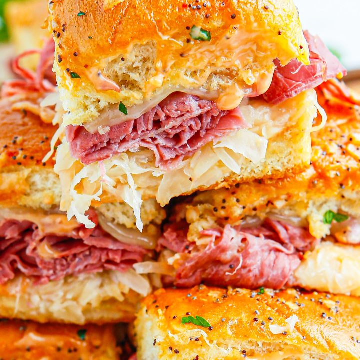 baked sliders in a stack