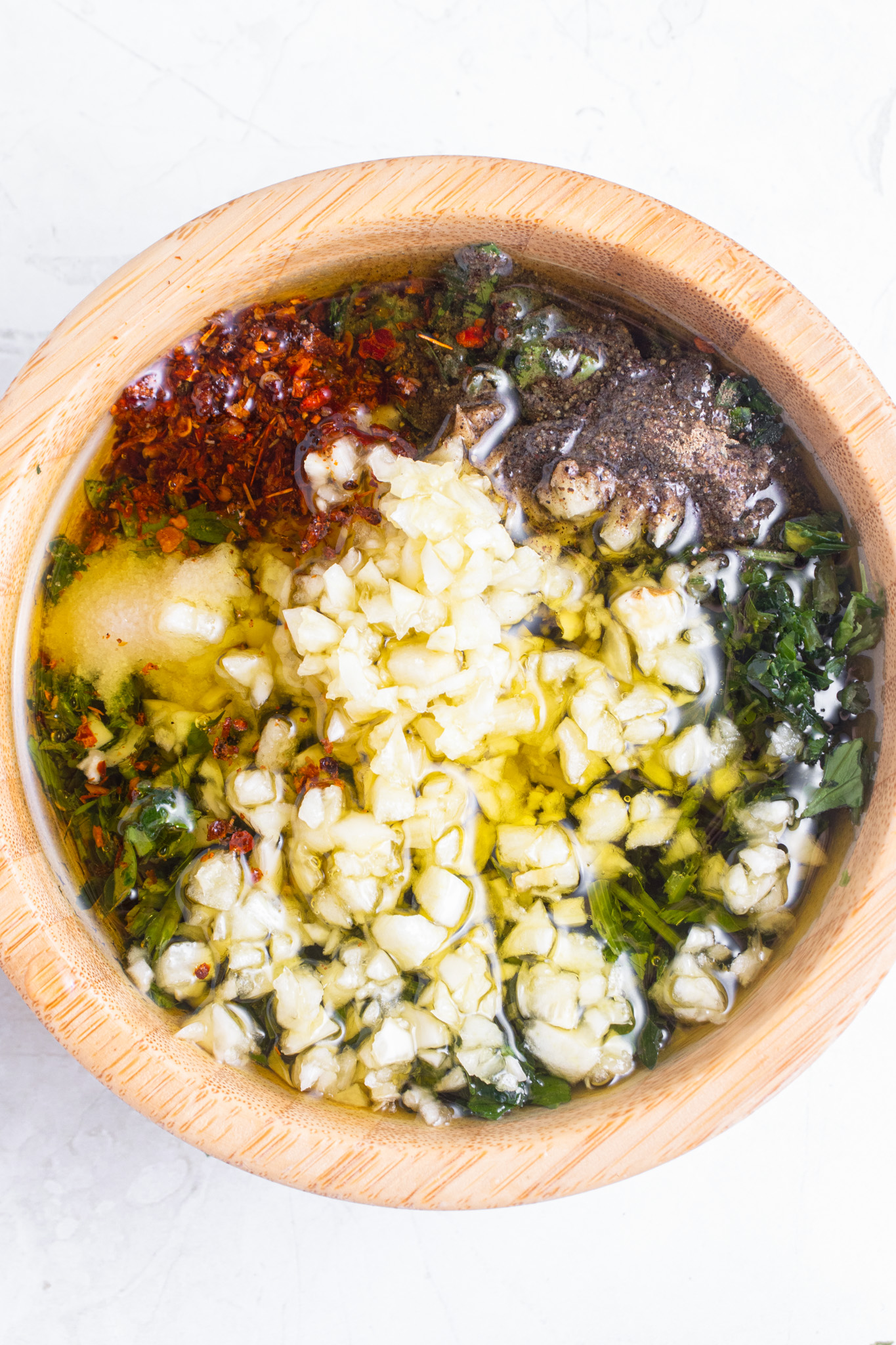 chimichurri ingredients in bowl