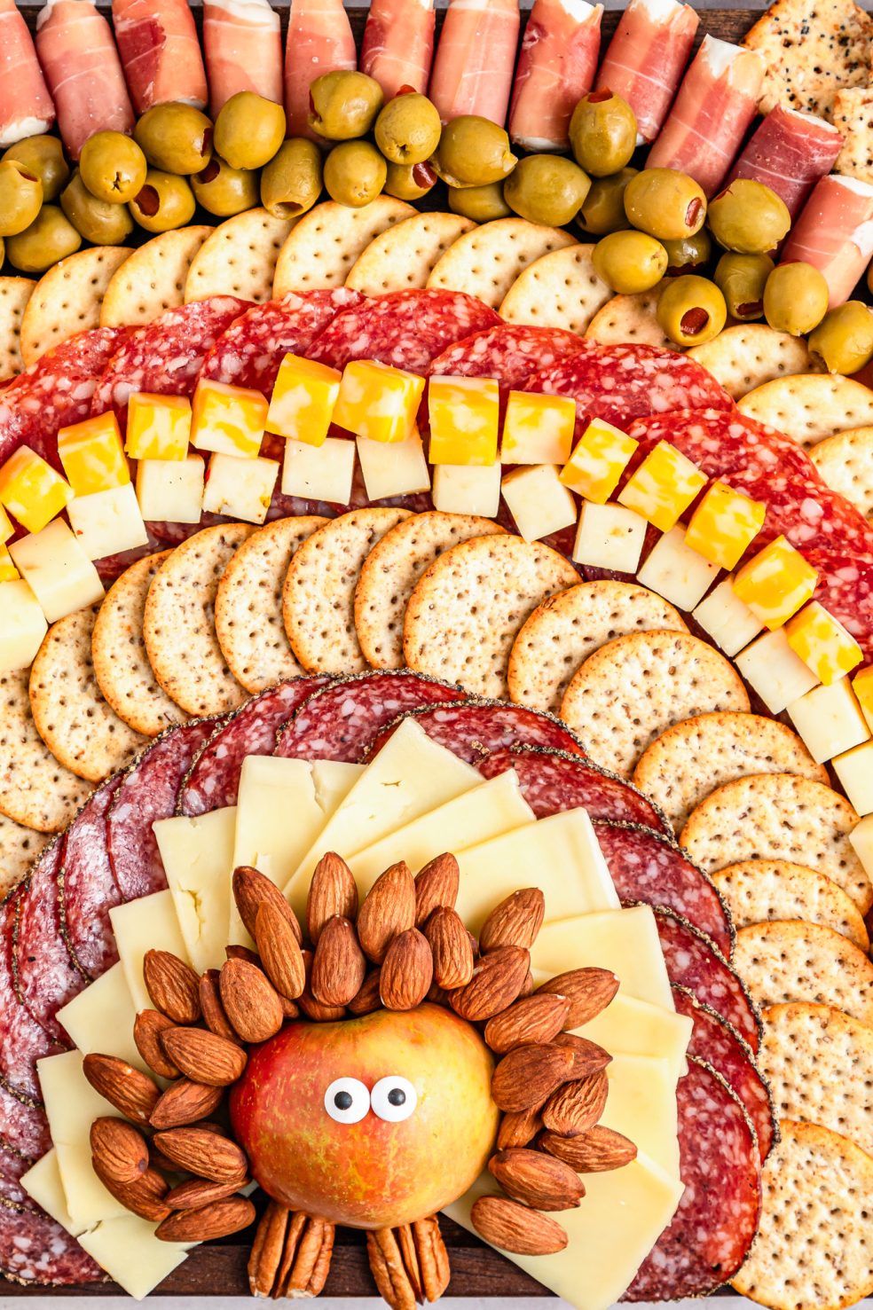 meat and cheese arranged to look like a turkey