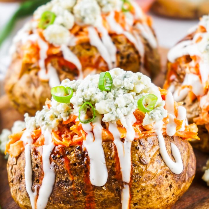 prepared potatoes on wooden board