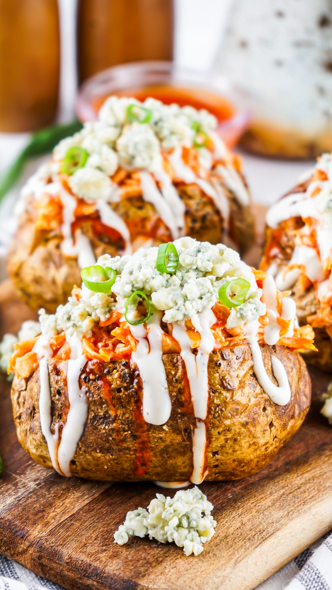 prepared potatoes on wooden board