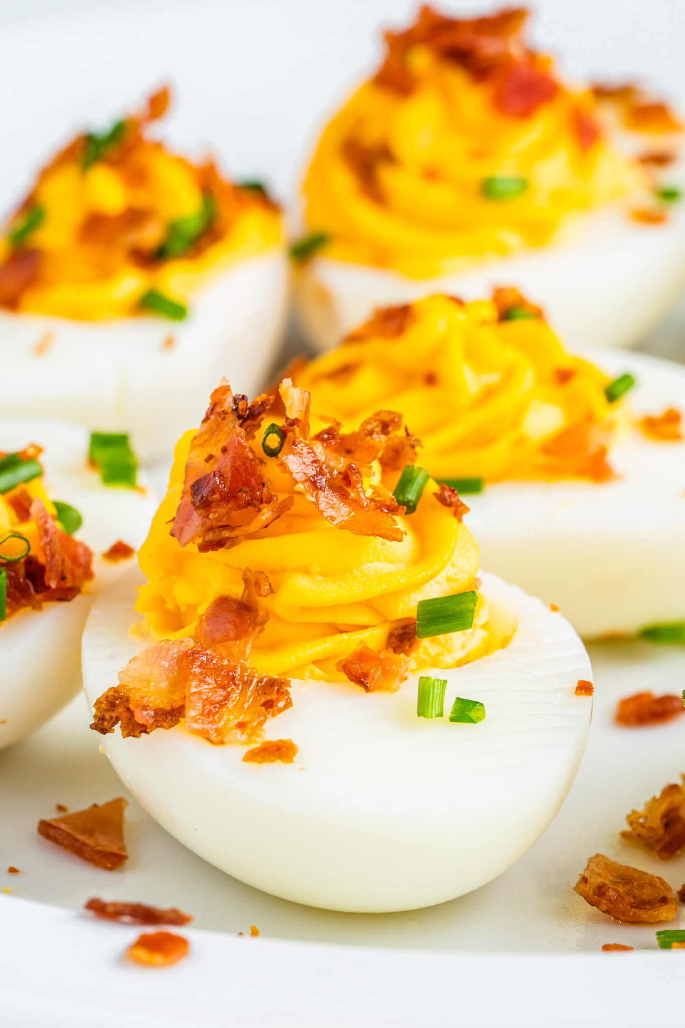 deviled egg topped with bacon crumbles