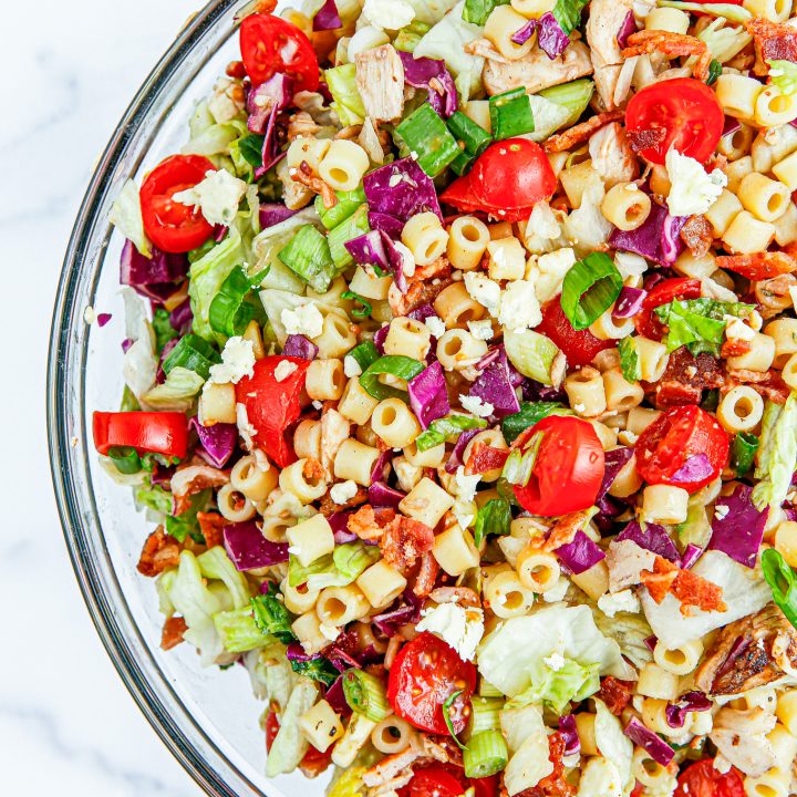 prepared salad in clear glass bowl