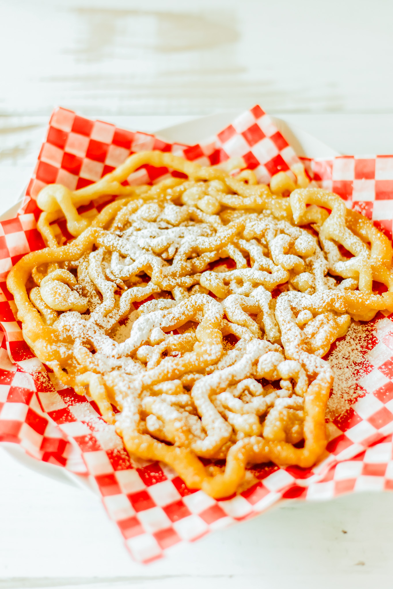 funnel cake topped with powdered sugar