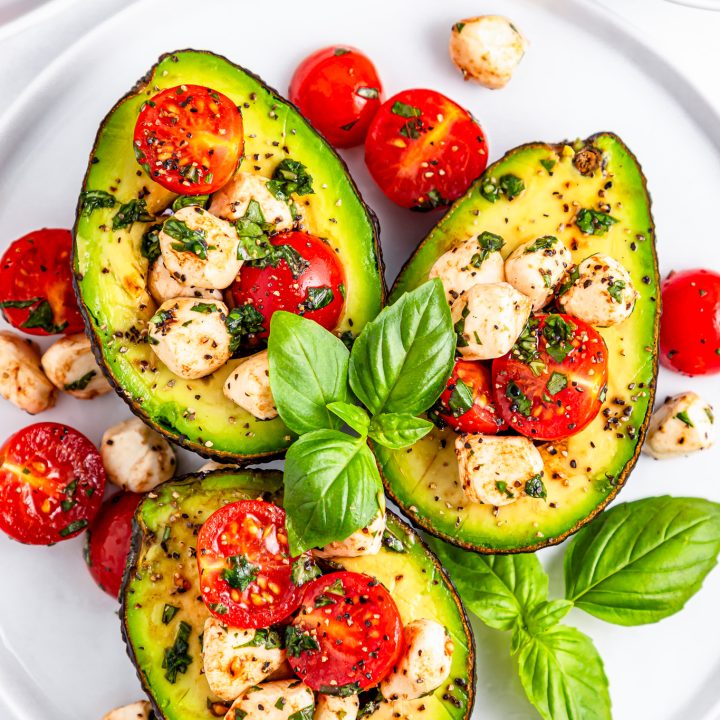 prepared avocados on white plate