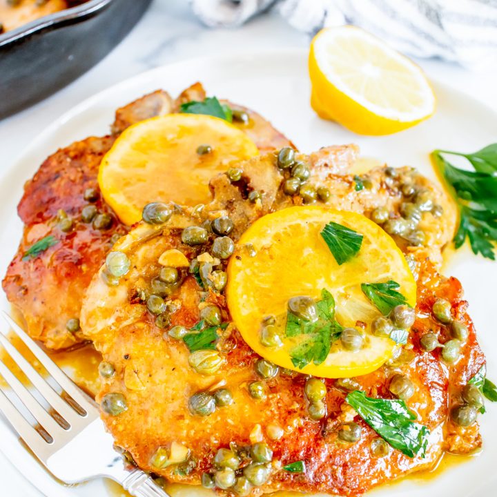prepared pork chops on white plate