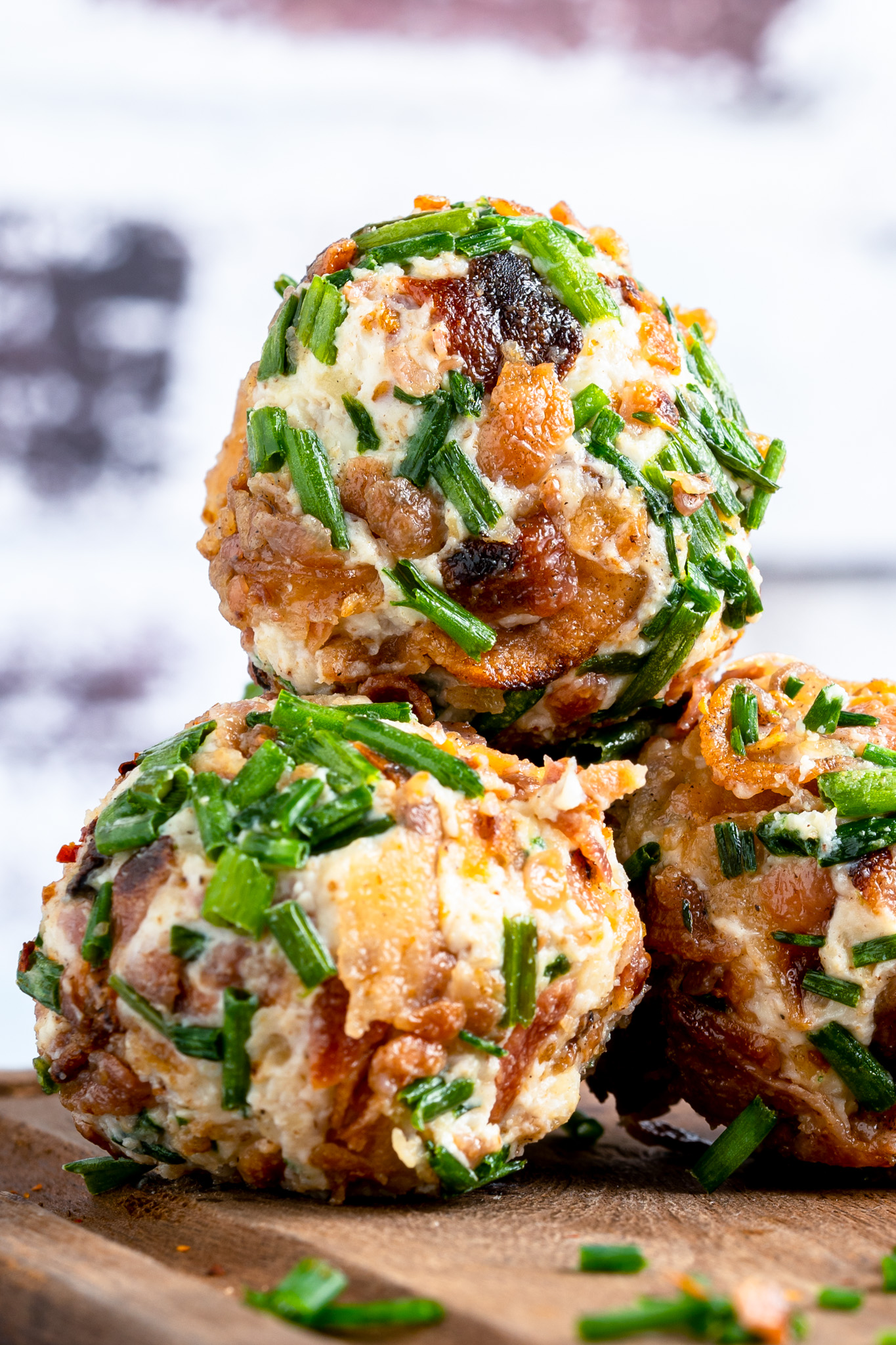 cheeseballs rolled in chopped bacon and chives