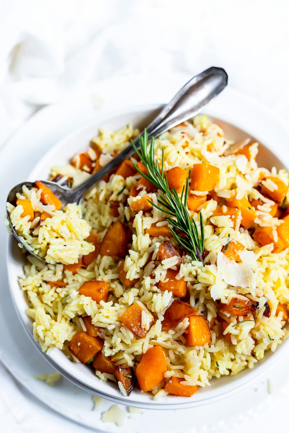 rice in serving bowl with spoon