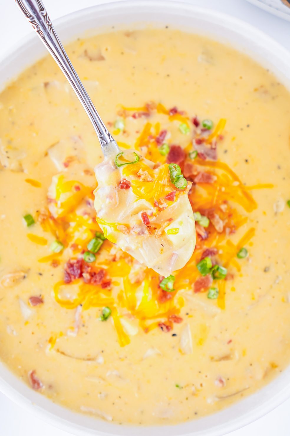 spoon scooping bite of soup